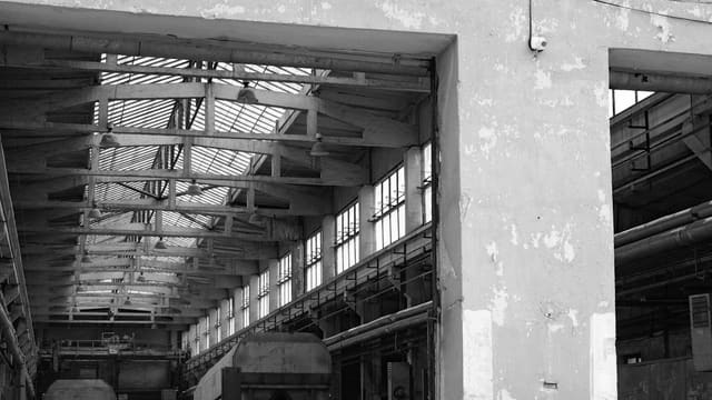 Old train workshop with natural light from windows