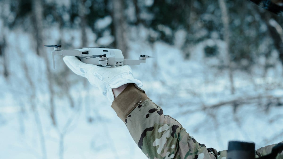 a person holding a drone